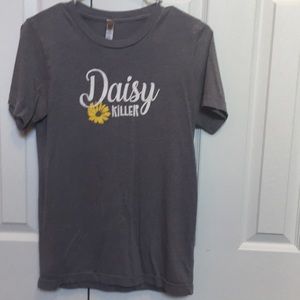 Grey t-shirt with daisy killer design on front.